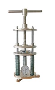 Dispositivo de compressão para polímeros – Norma ASTM D395 – Método A